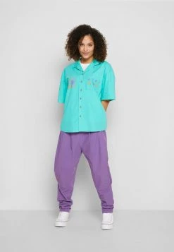 Buy 🛒 Quiksilver STRANGER THINGS THE ARGYLE PANT 2.0 - Trousers - Deep Lavender 🧨